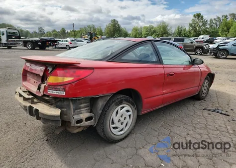 1999 Saturn Sc1 z USA, uszkodzony, nr VIN 1G8ZP1287XZ243932